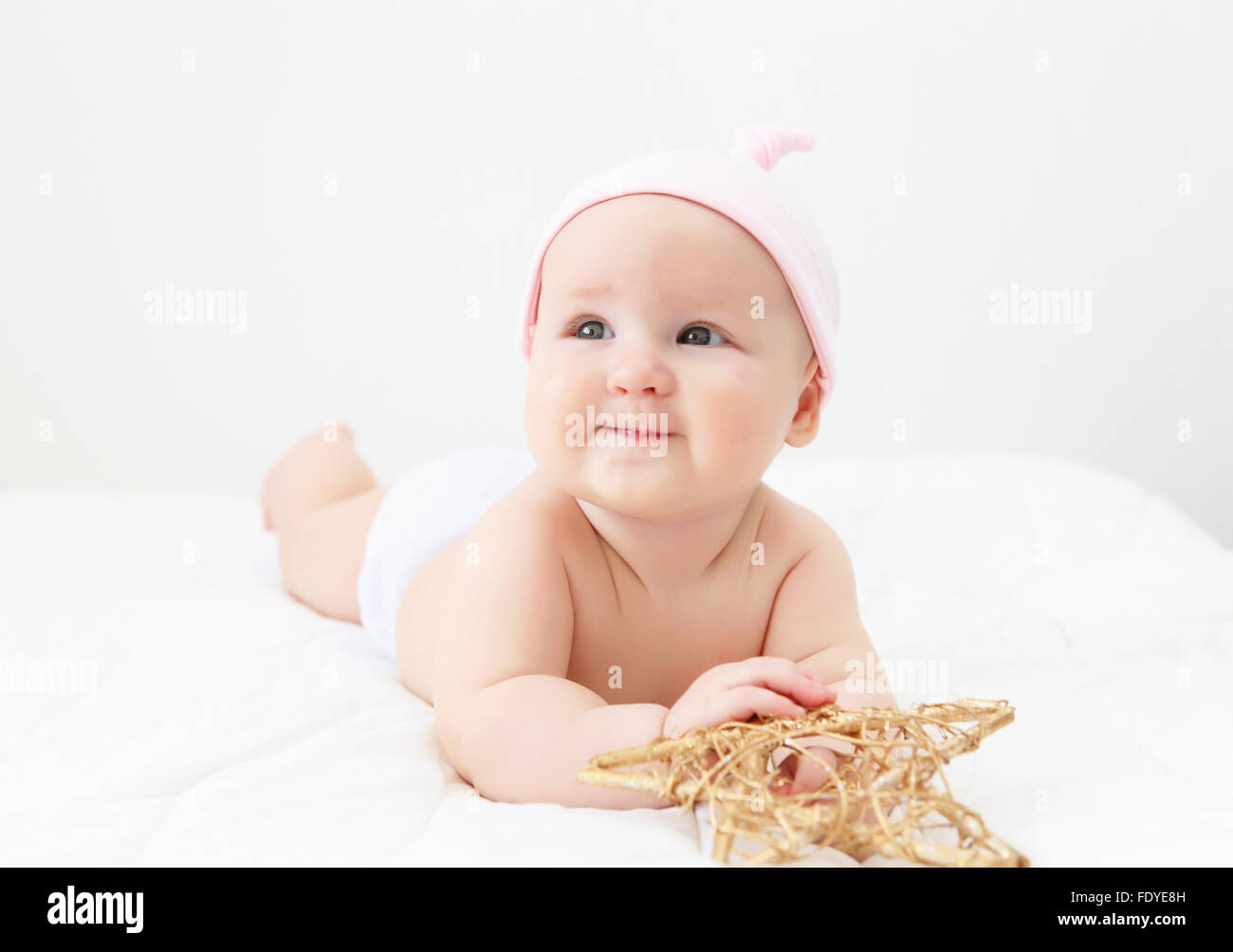 Portrait of a young child on a white background. Baby Stock Photo Alamy
