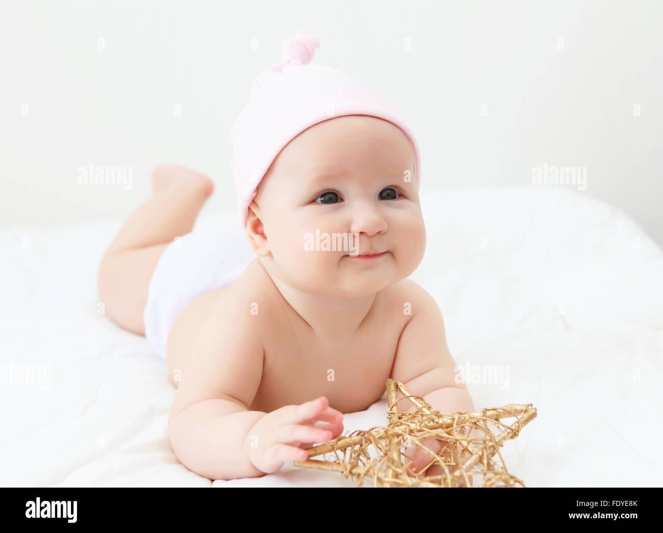 Portrait of a young child on a white background. Baby Stock Photo - Alamy
