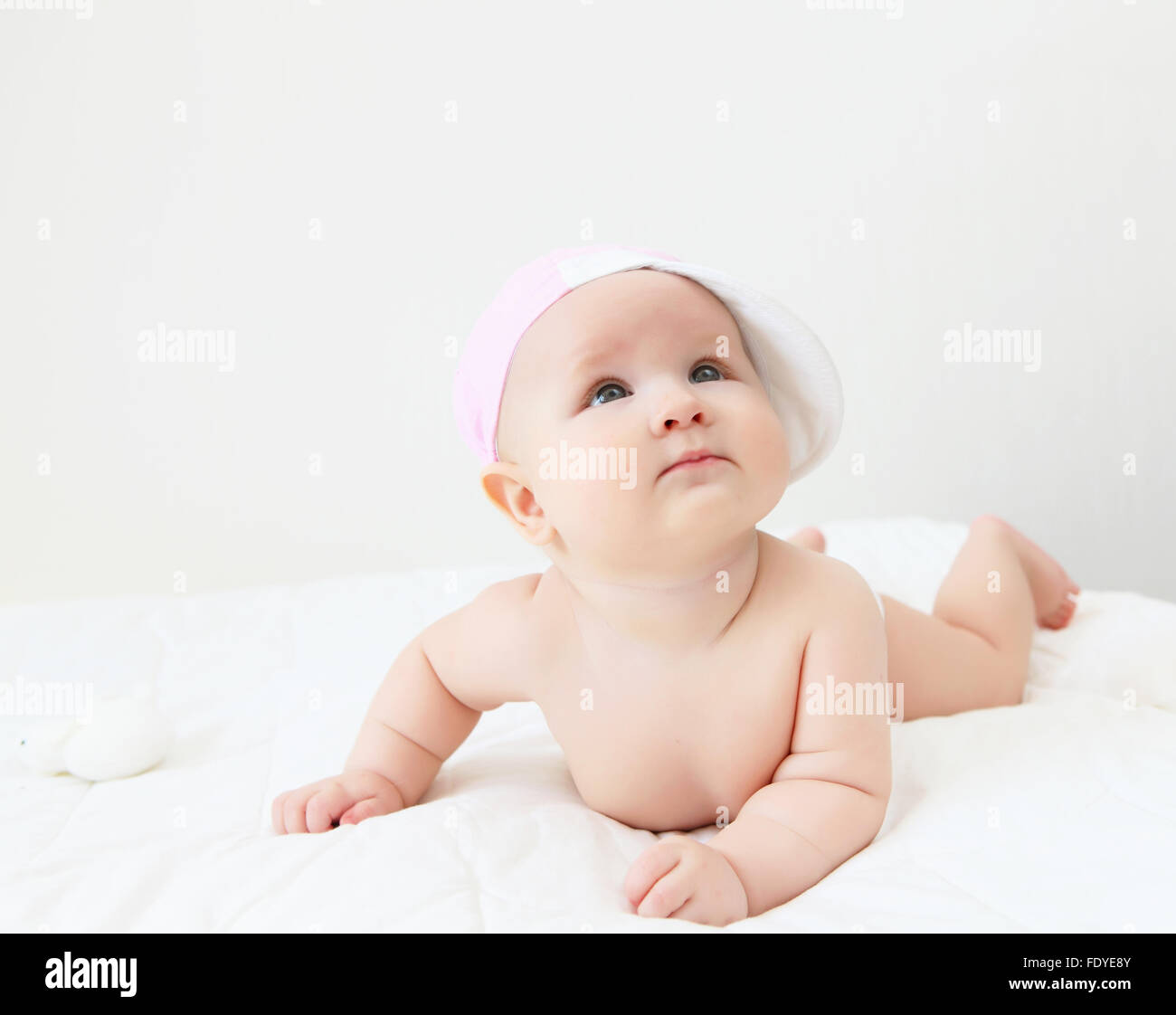Portrait of a young child on a white background. Baby Stock Photo - Alamy