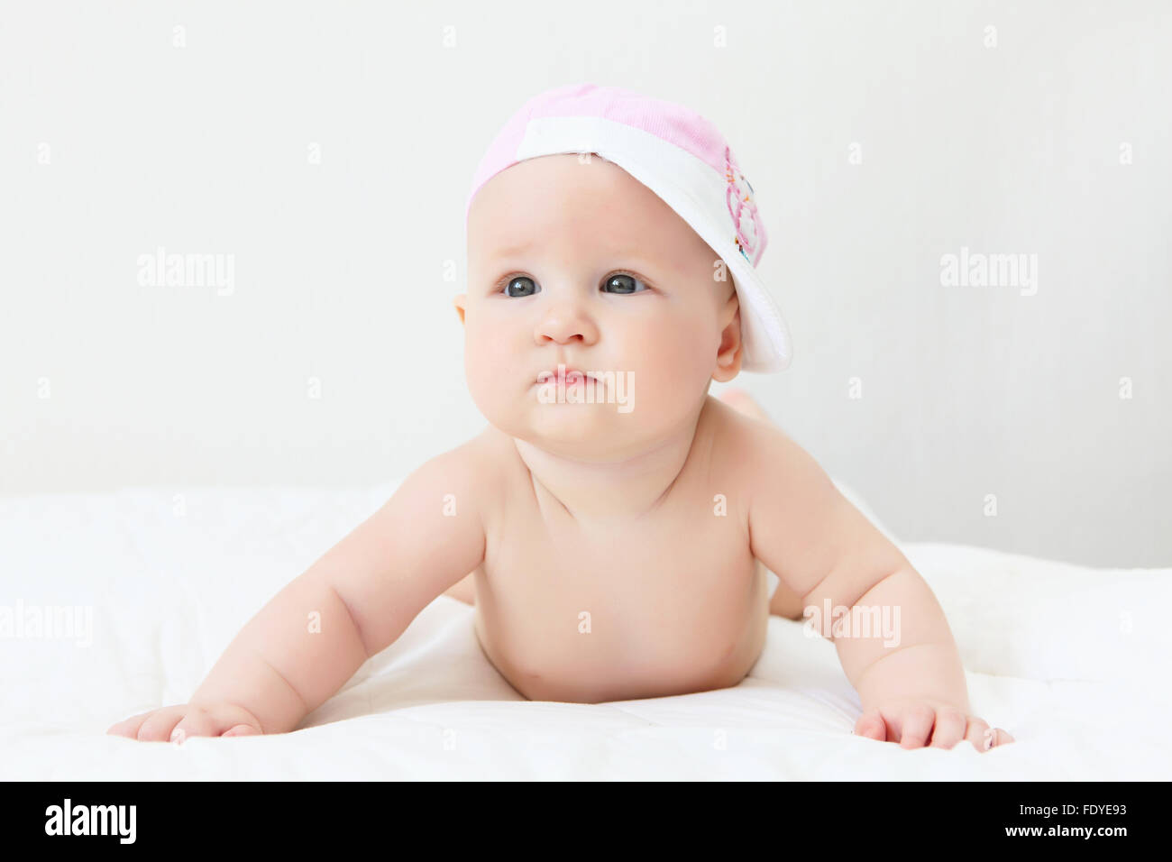 Portrait of a young child on a white background. Baby Stock Photo - Alamy