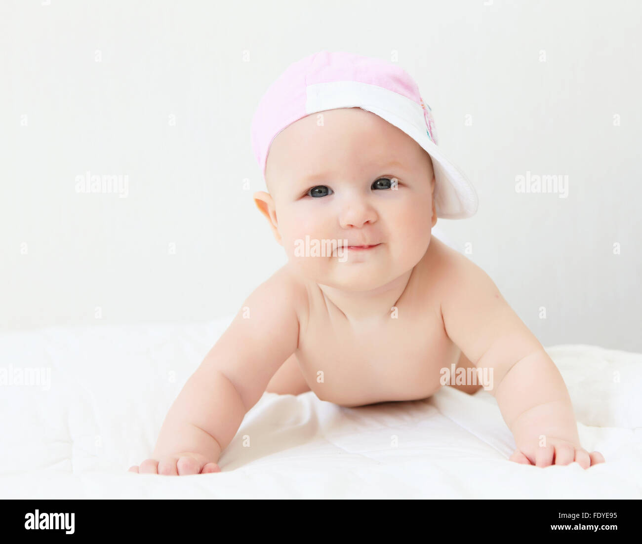 Portrait of a young child on a white background. Baby Stock Photo - Alamy