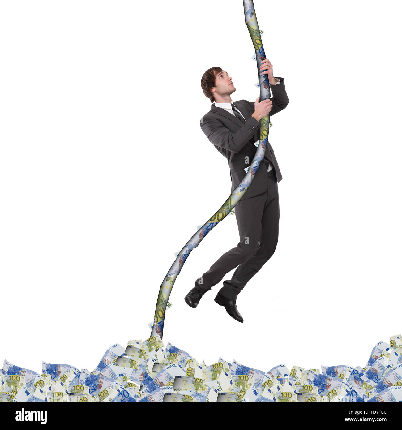 business man in black suit ckimbing up the rope of banknotes Stock ...