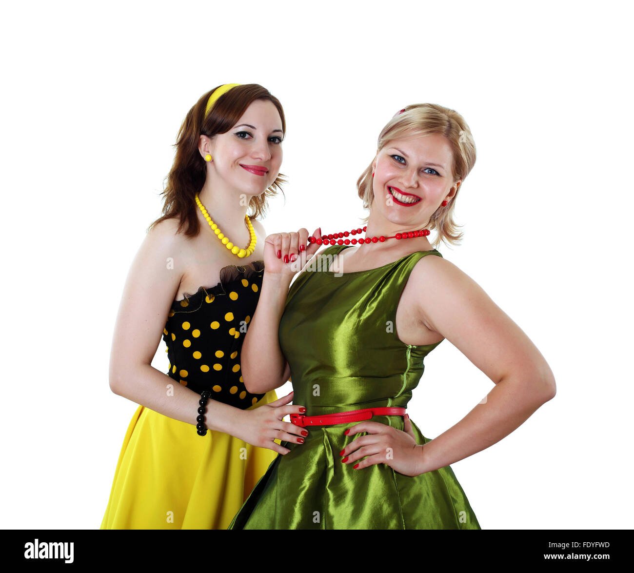 Rockabilly Girls Posing In 1950s Style Clothing In Front Of Colorful  Background Stock Photo, Picture and Royalty Free Image. Image 67375225.