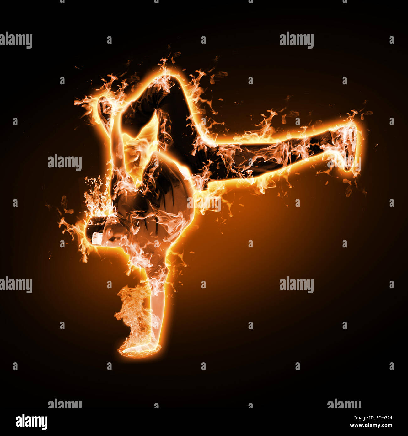 Flame and fire dancer against black background Stock Photo Alamy