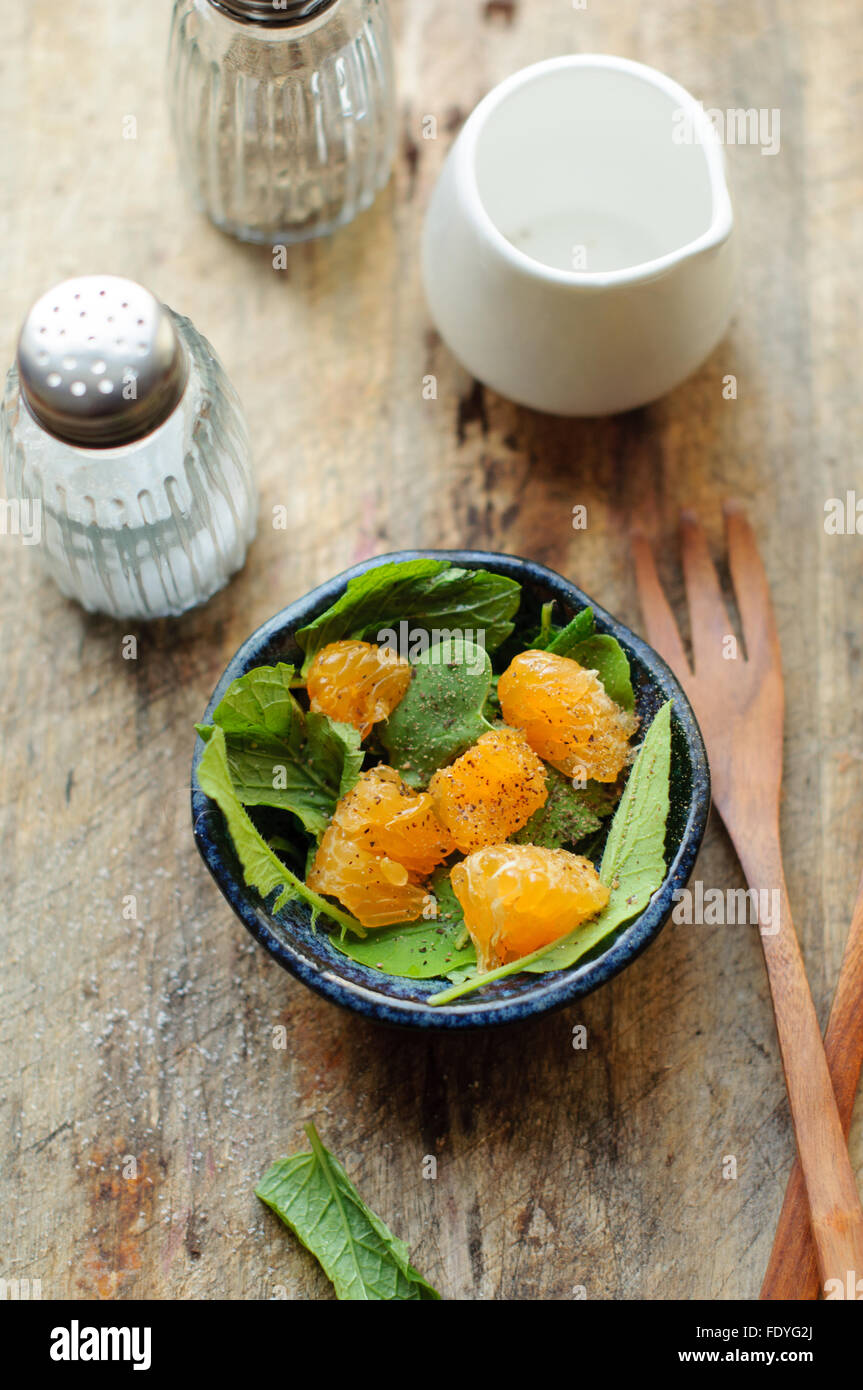 Orange Salad with Radish leaves Stock Photo Alamy