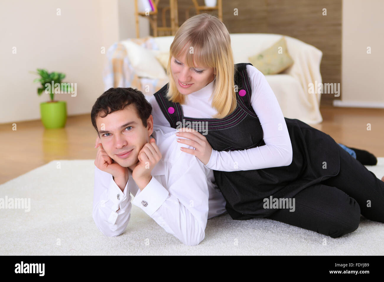 a happy young couple in love at home together Stock Photo - Alamy