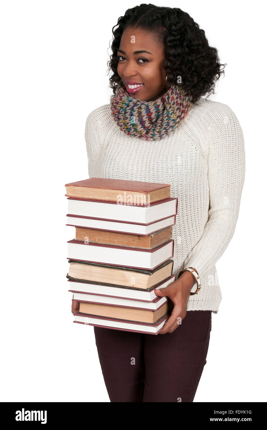 Beautiful woman holding a stack of library books Stock Photo - Alamy