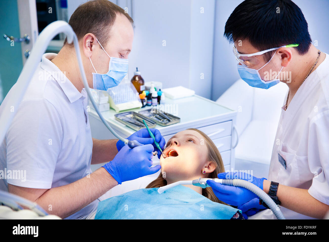 dentist treats teeth Stock Photo