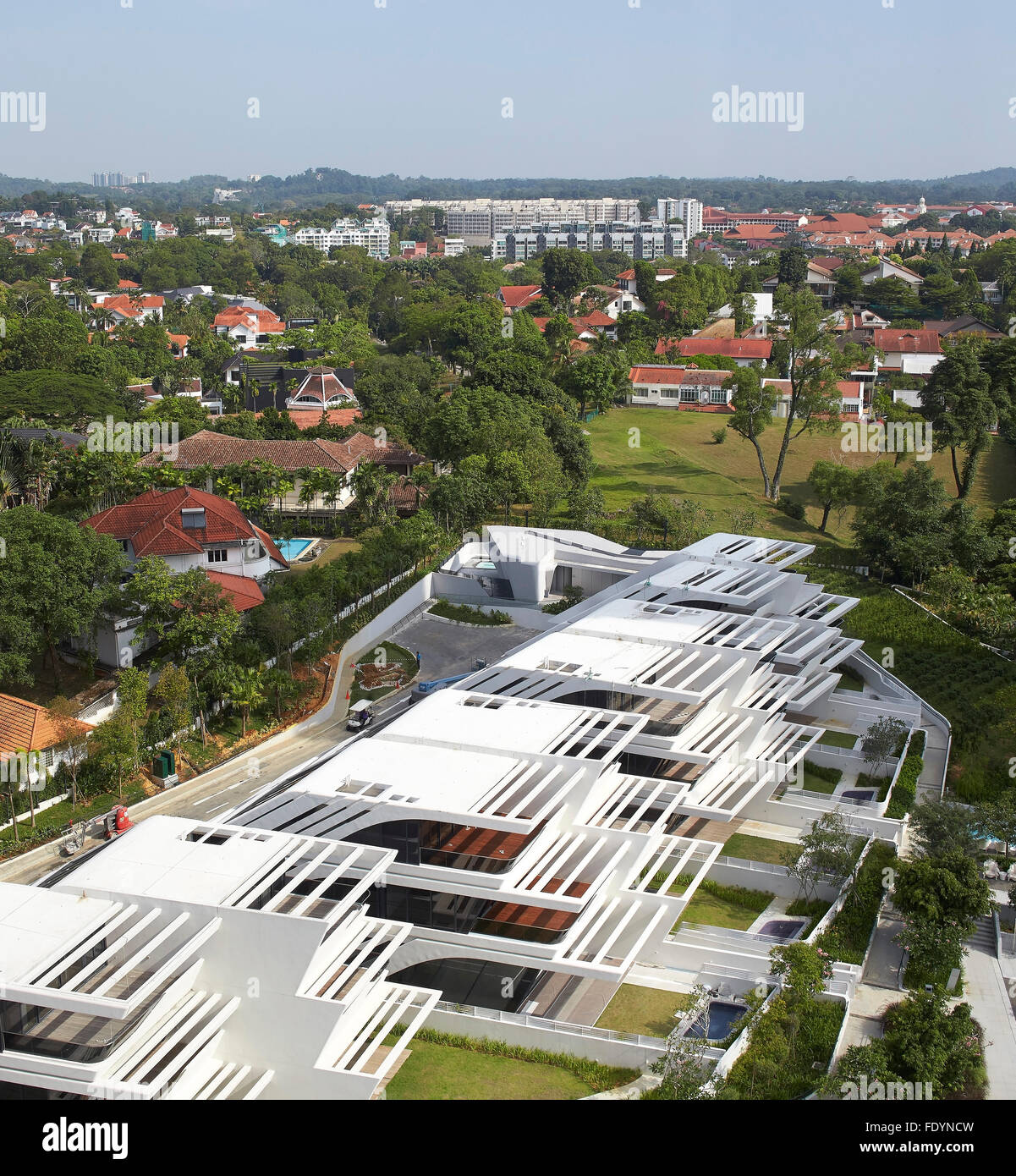 Semi-detached villas with context. d'Leedon Singapore, Singapore, Singapore. Architect: Zaha Hadid Architects, 2015. Stock Photo