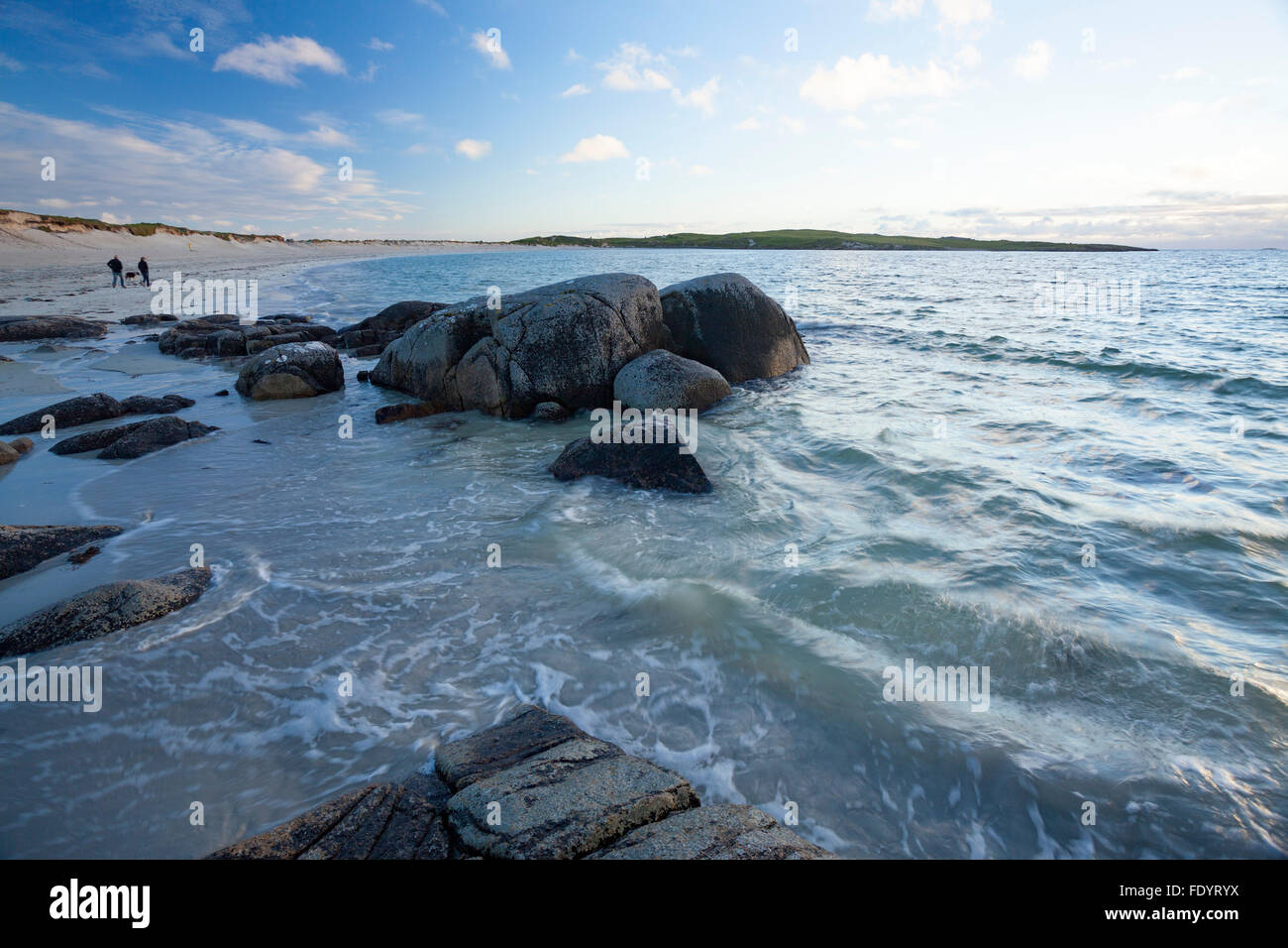 Couple on the beach at Dog's Bay, Connemara, County Galway, Ireland