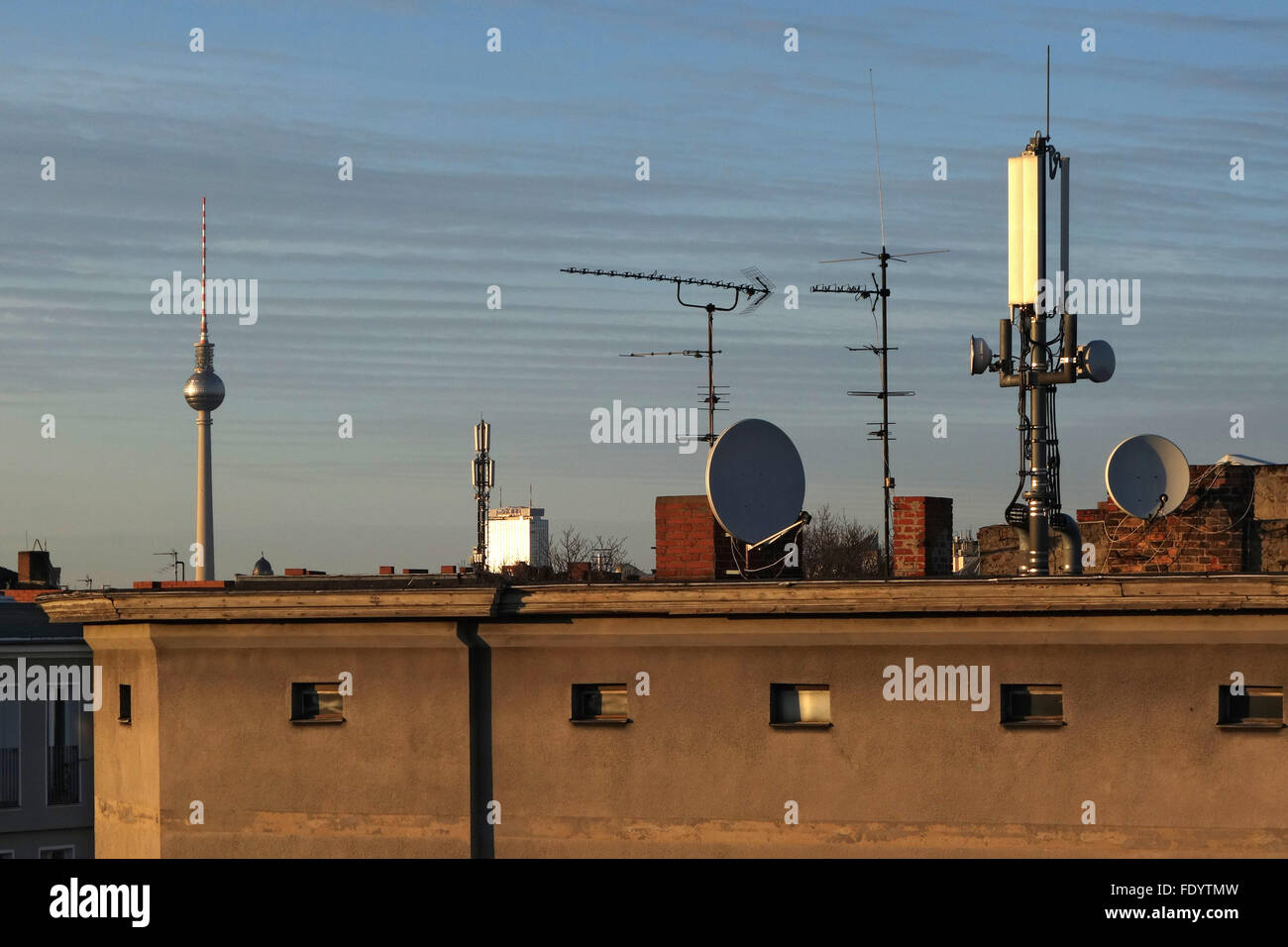 Berlin, Germany, radio masts, antennas and satellite bowls on a roof Stock Photo
