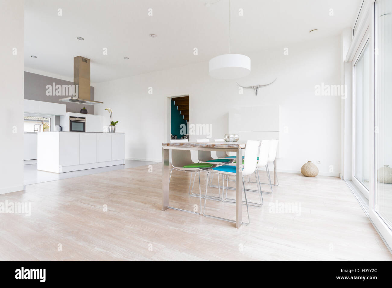 Interior of a modern bright dining-room with open kitchen Stock Photo ...