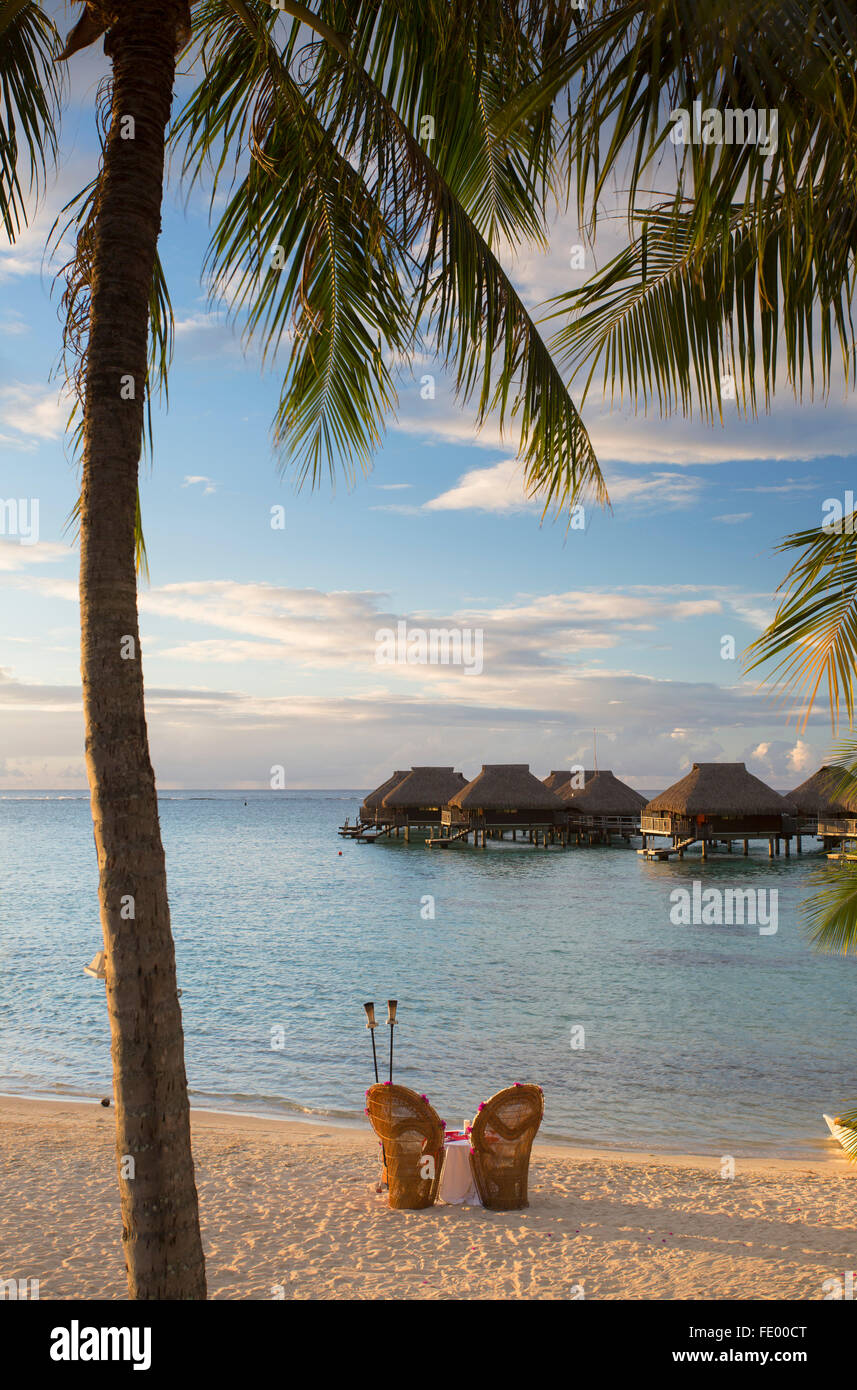 Overwater bungalows of Hilton Mo'orea Lagoon Resort Hotel, Moorea, Society Islands, French Polynesia Stock Photo