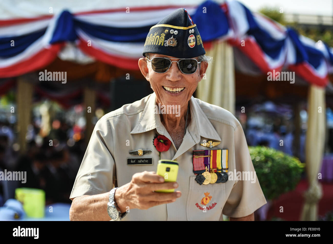 Bangkok, Thailand. 3rd Feb, 2016. A veteran attends a wreath-laying ceremony marking the Thai Veterans' Day at the Victory Monument in Bangkok, Thailand, Feb. 3, 2016. Thailand honored its ex-servicemen on Wednesday as the country's Veterans' Day was observed nationwide. In Bangkok, representatives of both veterans and current servicemen presented floral tributes at the Victory Monument, while attending a commemorative event held by the War Veteran's Organization of Thailand. Credit:  Li Mangmang/Xinhua/Alamy Live News Stock Photo