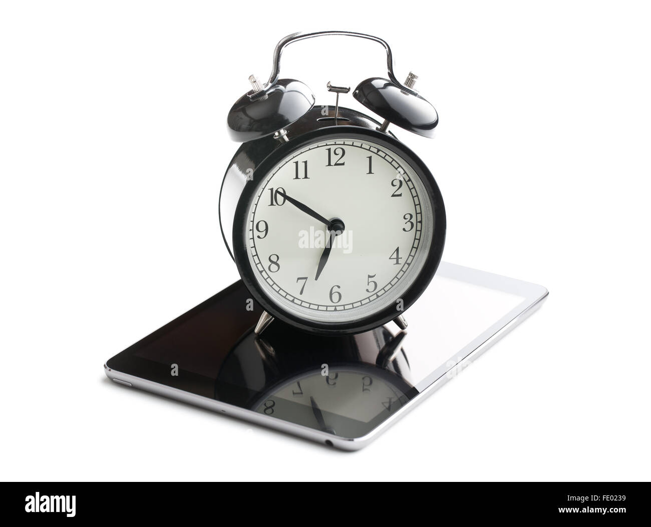alarm clock and computer tablet on white background Stock Photo Alamy