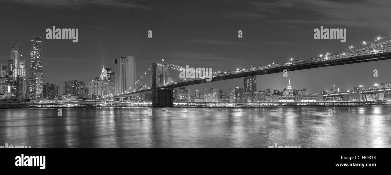 Brooklyn Bridge and Manhattan at night, New York City, USA. Stock Photo