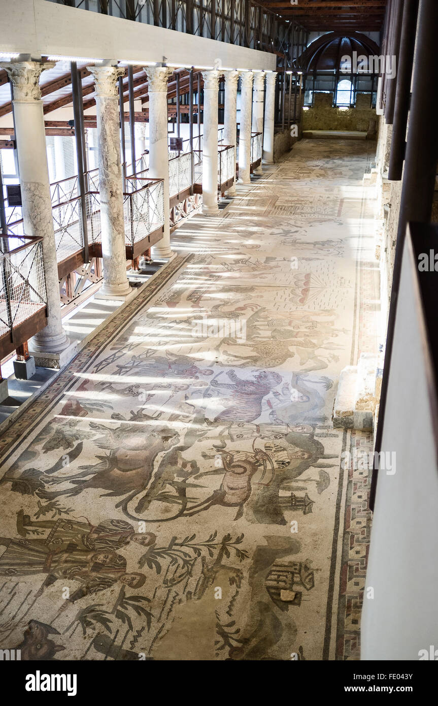 Roman mosaics and corridor hallway in Villa Romana del Casale, Piazza Armerina, Sicily, Italy Stock Photo