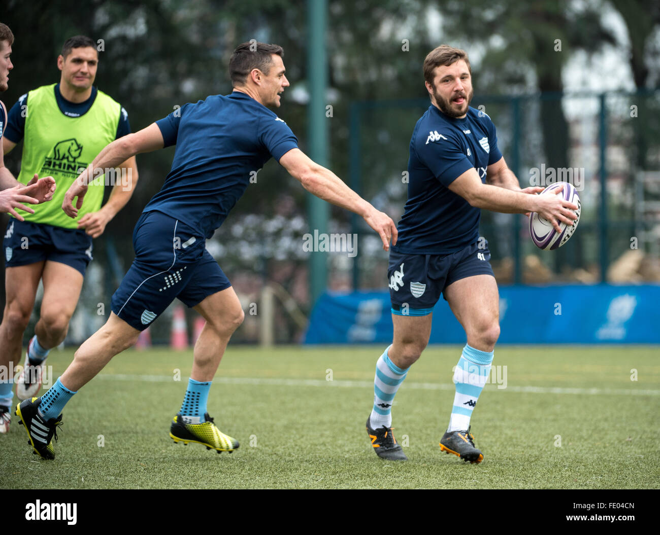 Hong Kong, China. 03rd Feb, 2016. Fly-Half DAN CARTER (L) takes on winger MARC ANDREU (R) during French rugby union team Racing 92's  team training in Hong Kong. They are preparing ahead of their upcoming match against New Zealand's Super League team, The Highlanders Credit:  Jayne Russell/Alamy Live News Stock Photo