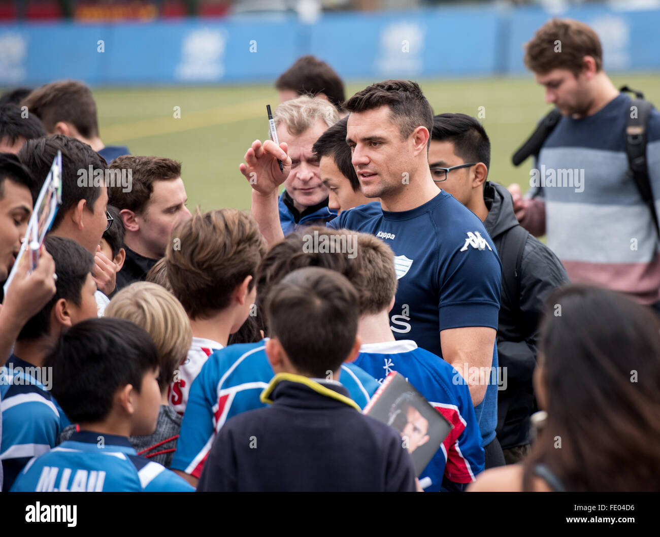 Hong Kong, China. 03rd Feb, 2016. Fly-Half DAN CARTER of French rugby union team, Racing 92 from Paris, swamped by fans after training in Hong Kong. They are preparing ahead of their upcoming match against New Zealand's Super League team, The Highlanders Credit:  Jayne Russell/Alamy Live News Stock Photo