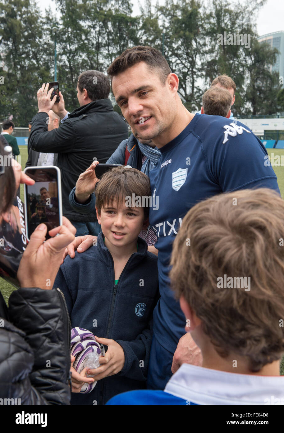 Hong Kong, China. 03rd Feb, 2016. Fly-Half DAN CARTER of French rugby union team, Racing 92 from Paris, swamped by fans after training in Hong Kong. They are preparing ahead of their upcoming match against New Zealand's Super League team, The Highlanders Credit:  Jayne Russell/Alamy Live News Stock Photo