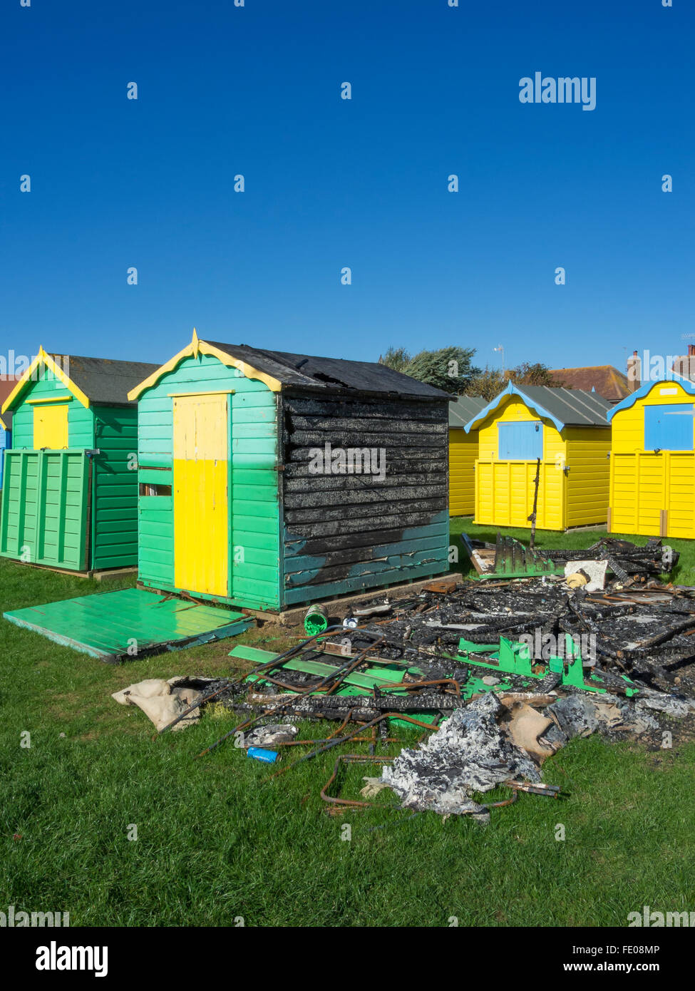 Burn beach hut at Felpham, West Sussex Stock Photo Alamy