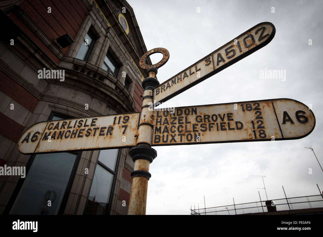A road sign for the A6 outside the Blossoms pub in Stockport which the band Blossoms, take their