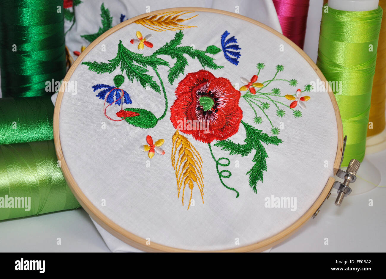 Fragment Of Fabric With Traditional Handmade Wooden Cross Stitch Embroidery  Frame, Floral Ornament Stock Photo, Picture and Royalty Free Image. Image  64685622.