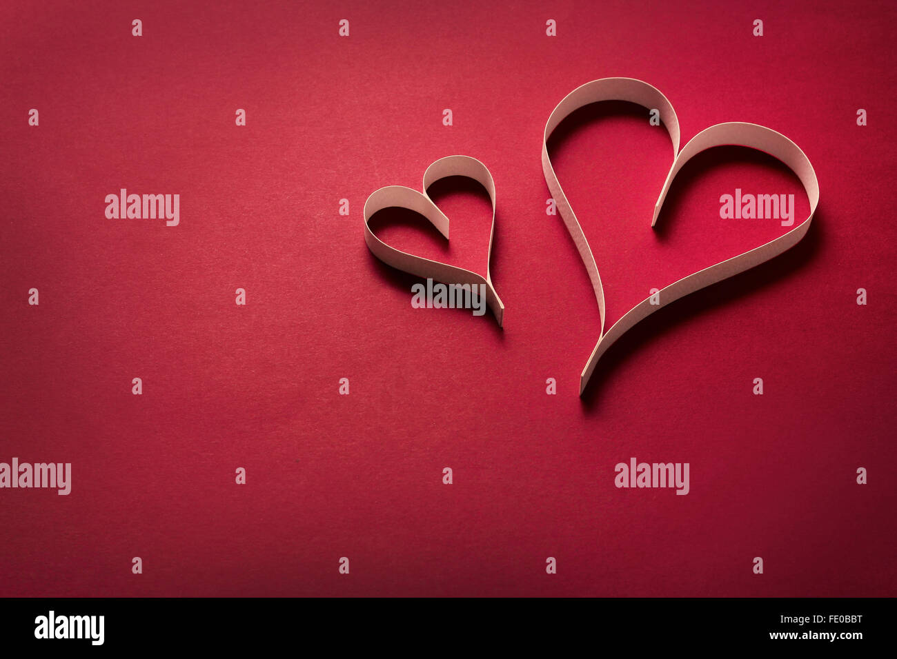 Paper hearts on a red background, blank space Stock Photo - Alamy