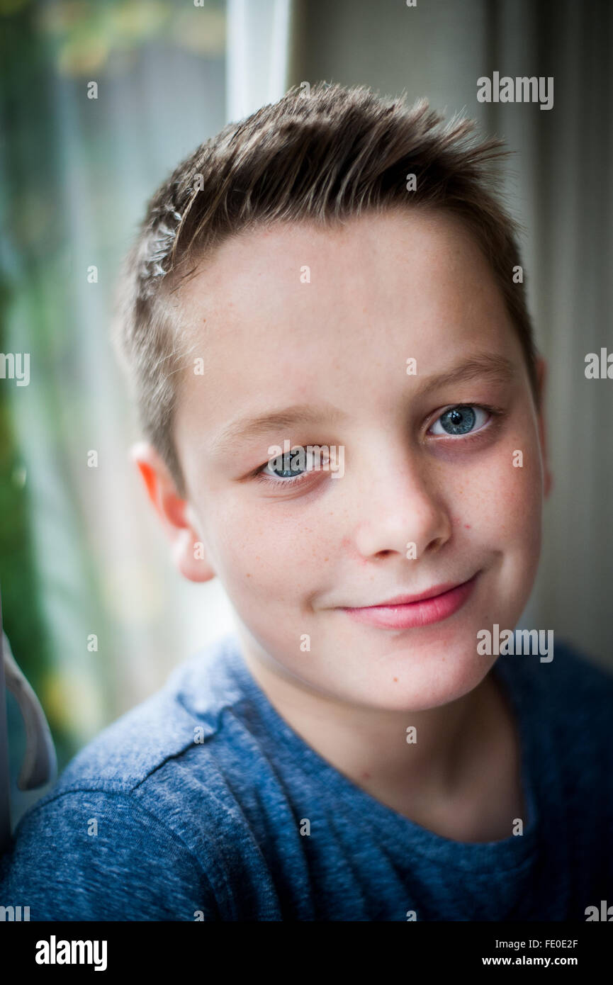 portrait of 12 year old boy smiling Stock Photo
