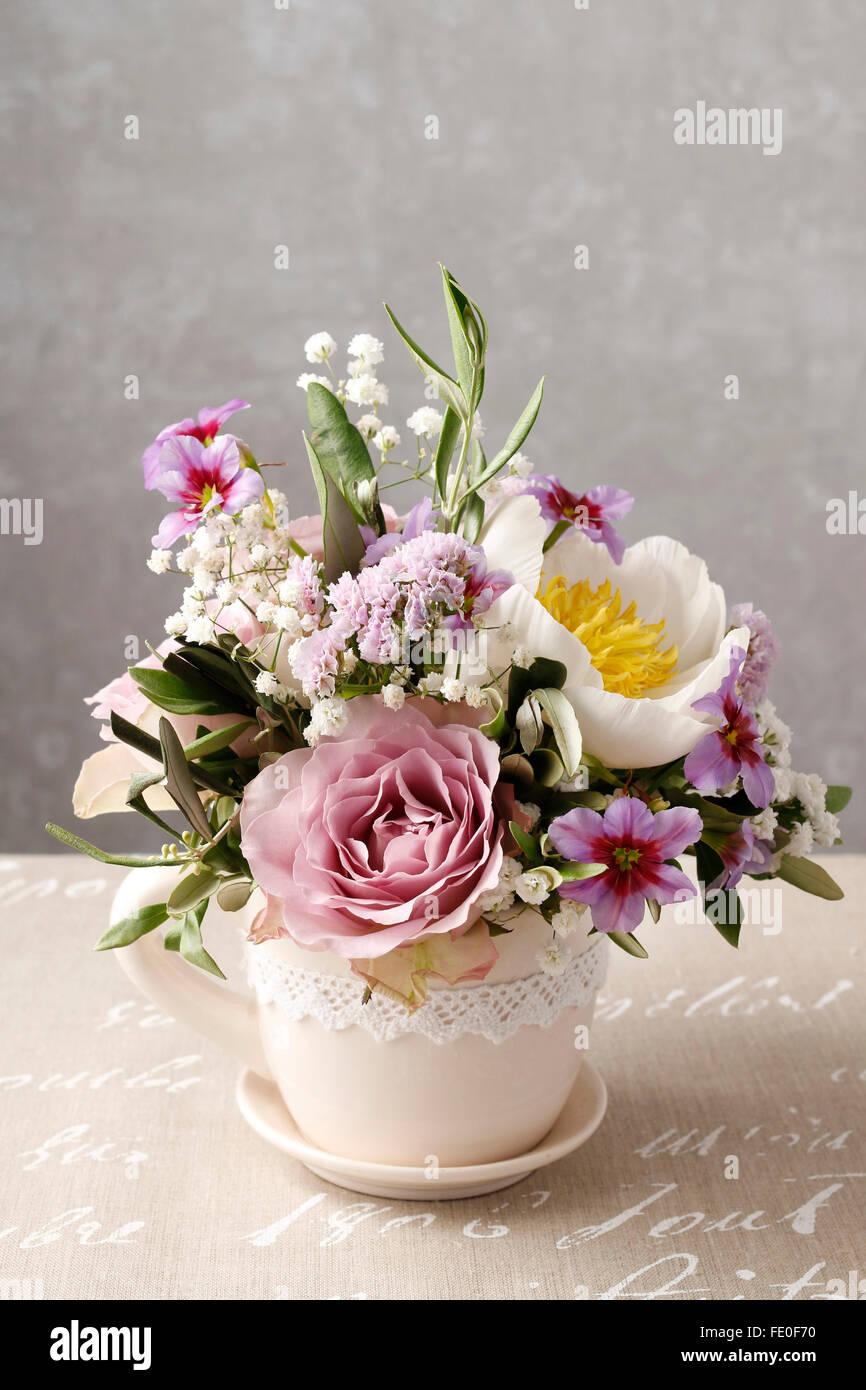 Romantic bouquet of roses and peonies Stock Photo
