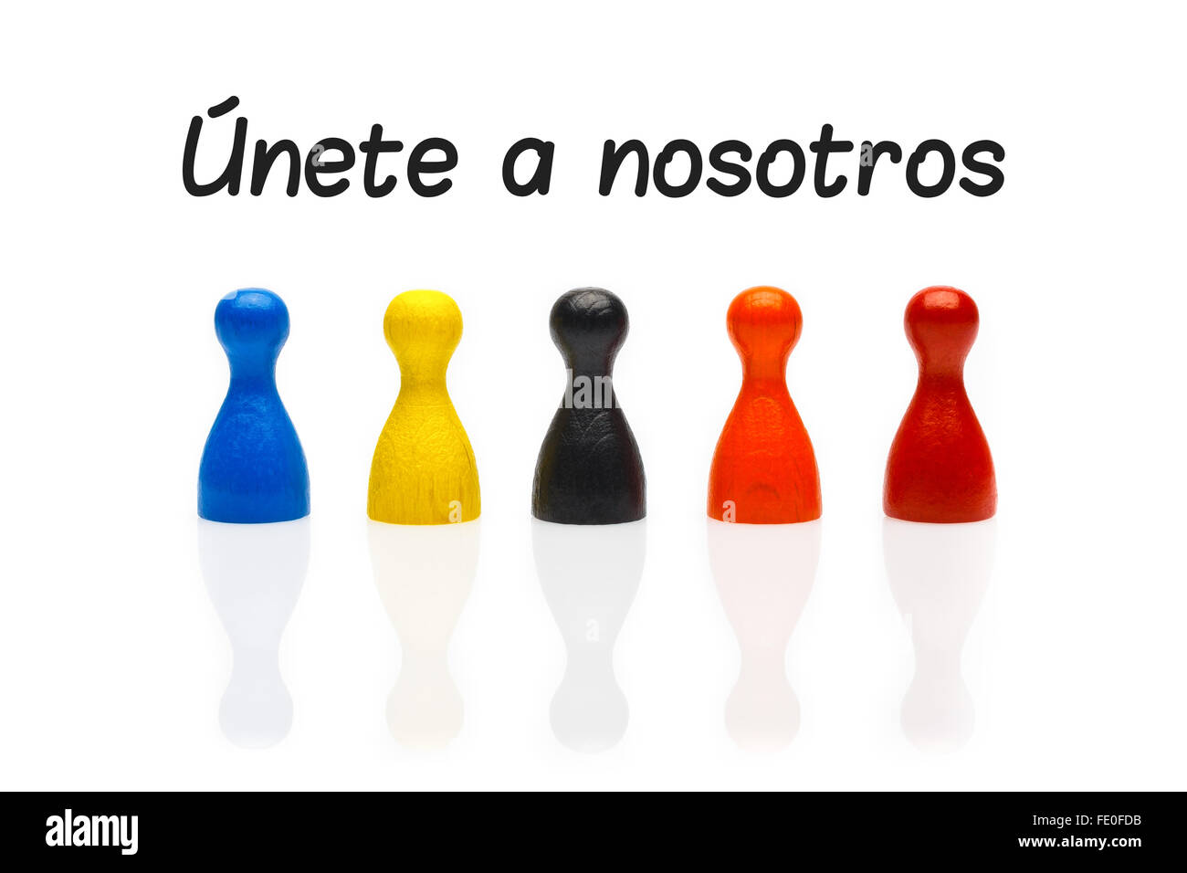 Business concept join our team with marker text in Spanish. Únete a nosotros. Several colored pawn figures isolated on white bac Stock Photo