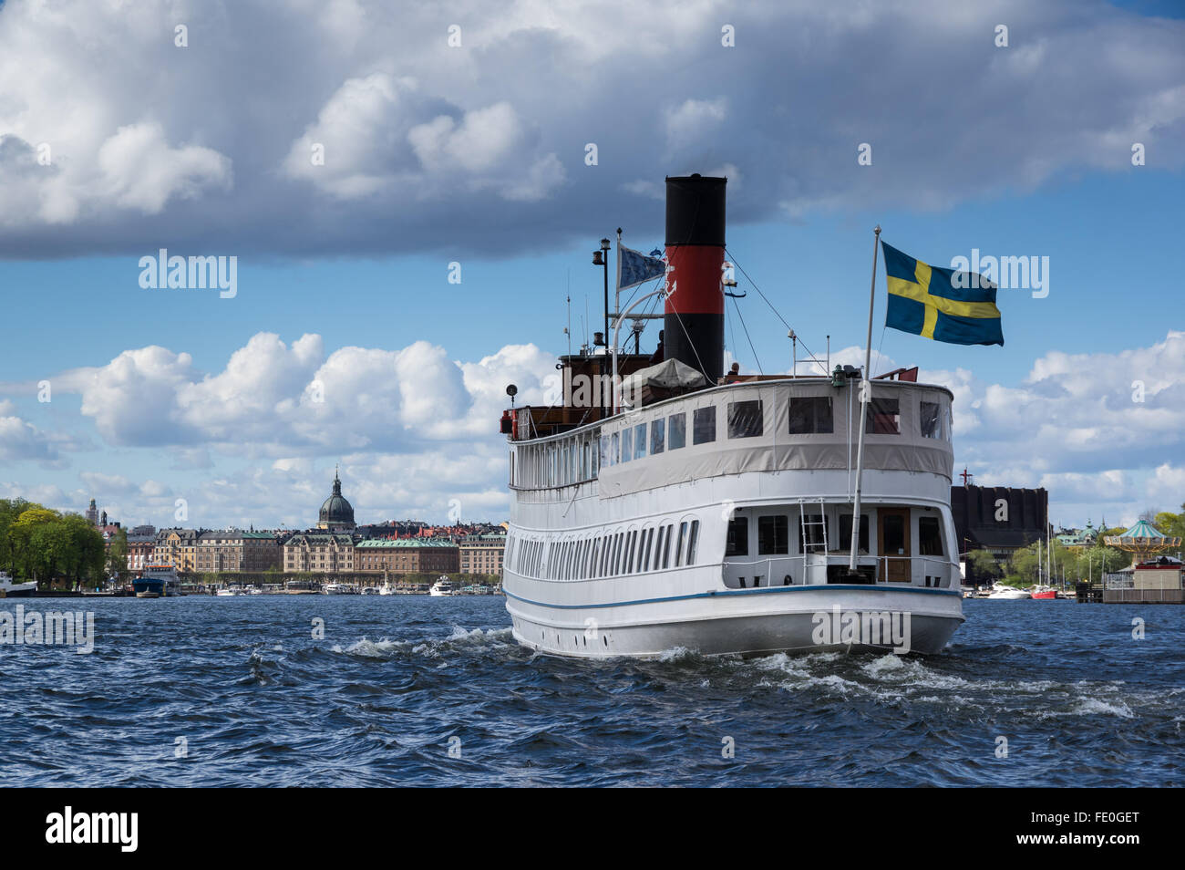 Ship heading to Stockholm city center Stock Photo