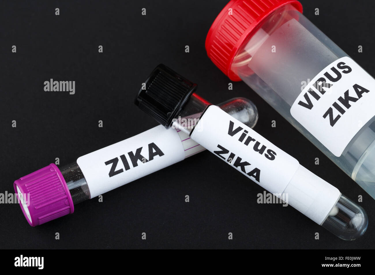 Zika virus concept photo with test tube on black background Stock Photo ...