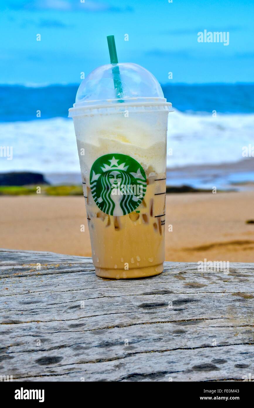 Starbucks coffee on the beach Stock Photo Alamy