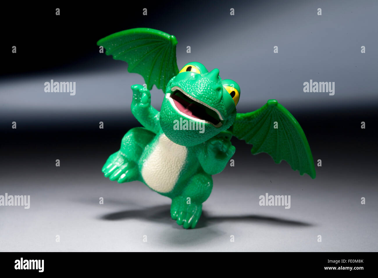 How to tame your Dragon happy meal toy on grey background Stock Photo