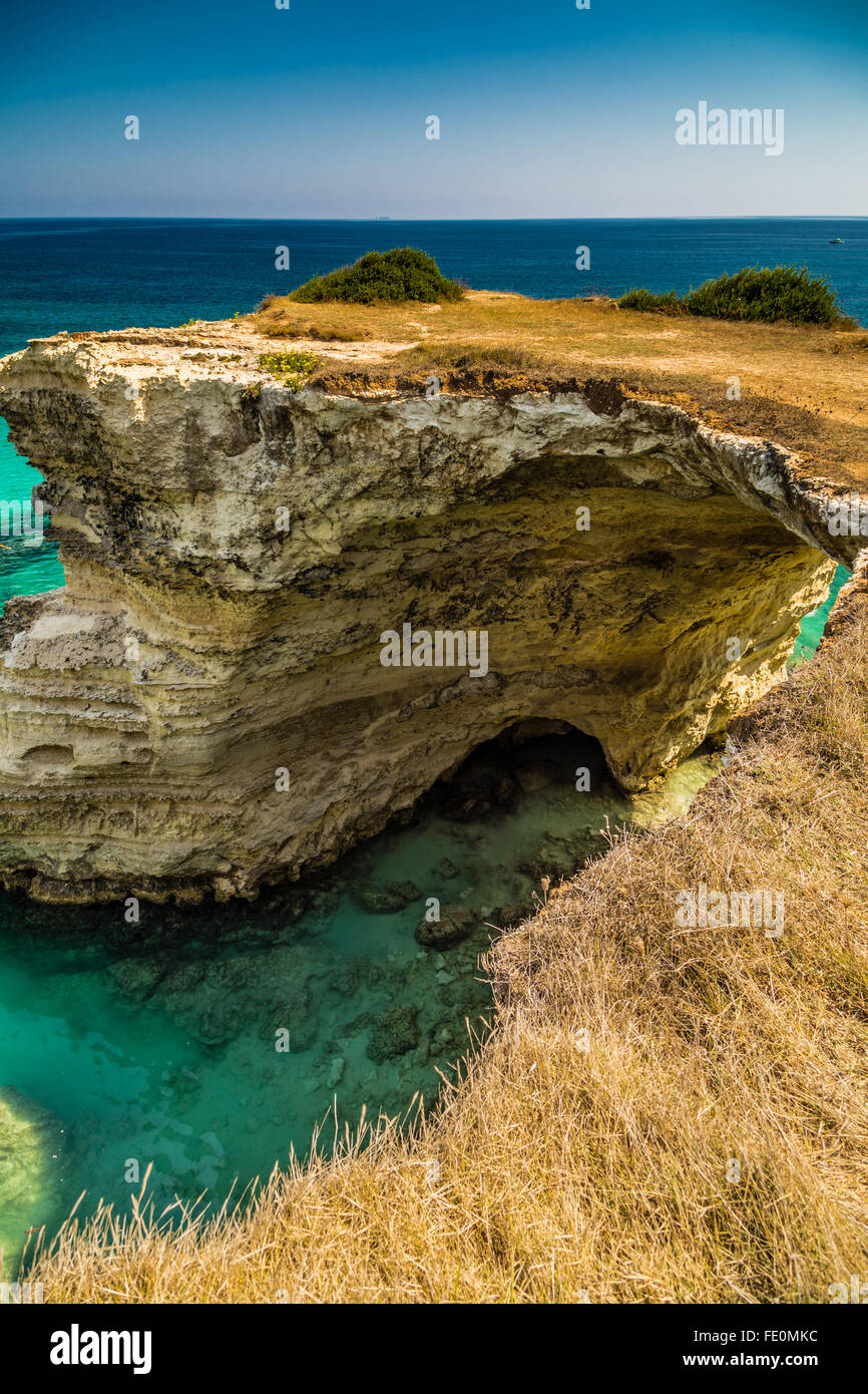 Rocky stacks on the coast of Apulia in Southern Italy Stock Photo