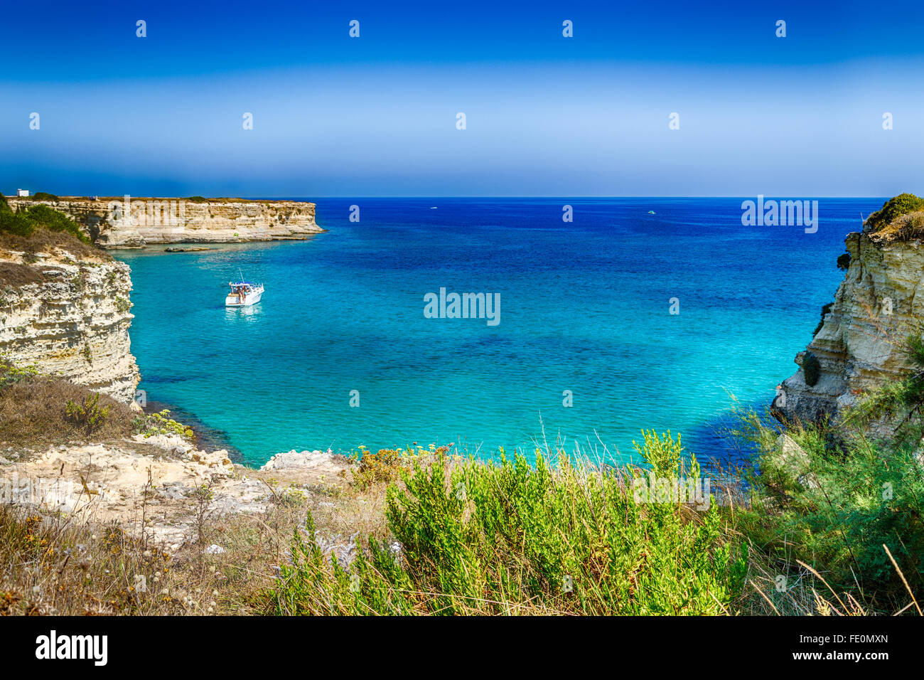 Rocky stacks on the coast of Apulia in Southern Italy Stock Photo