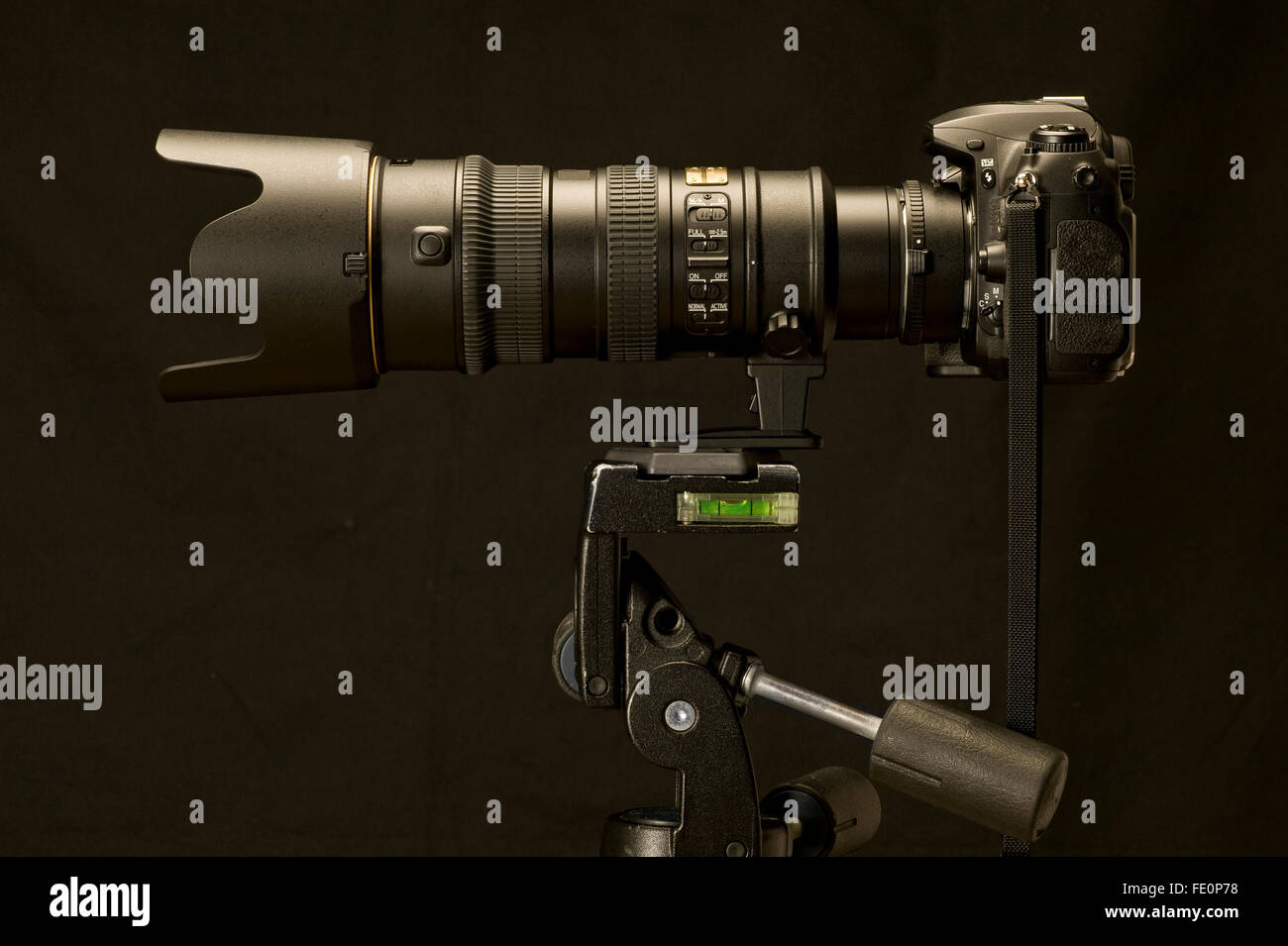 Professional Camera and Zoom Lens On Tripod Stock Photo Alamy