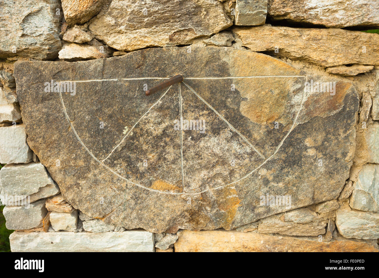 sundial on stone in a cloudy day Stock Photo Alamy
