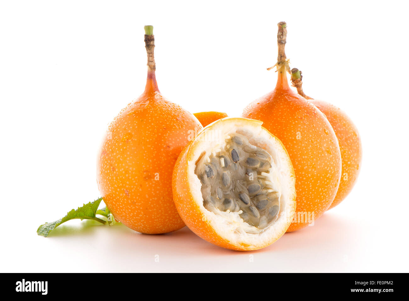 Passion fruit maracuja granadilla on white background Stock Photo - Alamy