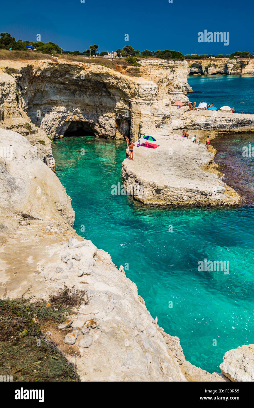 Rocky stacks of Saint Andrew Tower on the coast of Salento in Apulia in Southern Italy Stock Photo