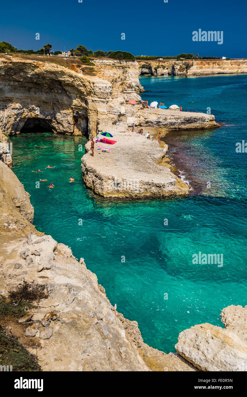 Rocky stacks of Saint Andrew Tower on the coast of Salento in Apulia in Southern Italy Stock Photo