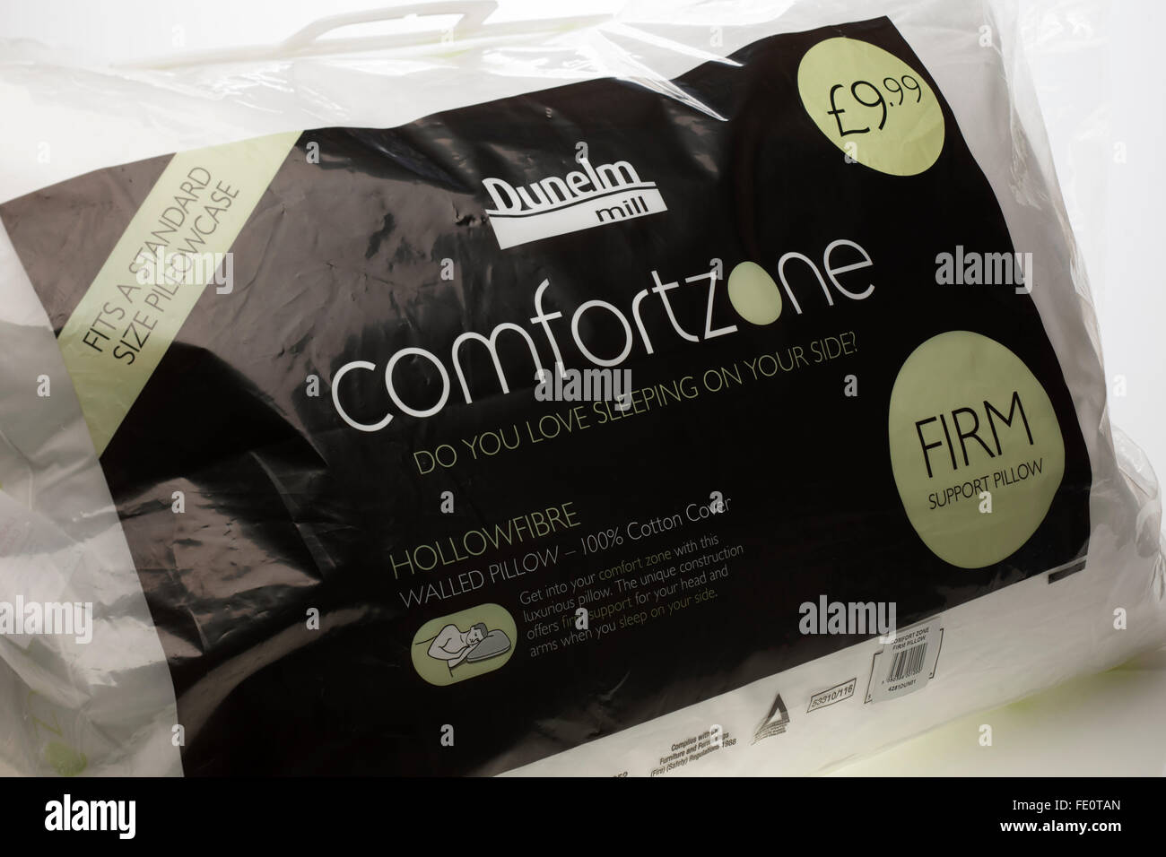 Dunelm Mill comfortzone hollowfibre firm walled support pillow price 9  pounds and 99 pence Stock Photo - Alamy
