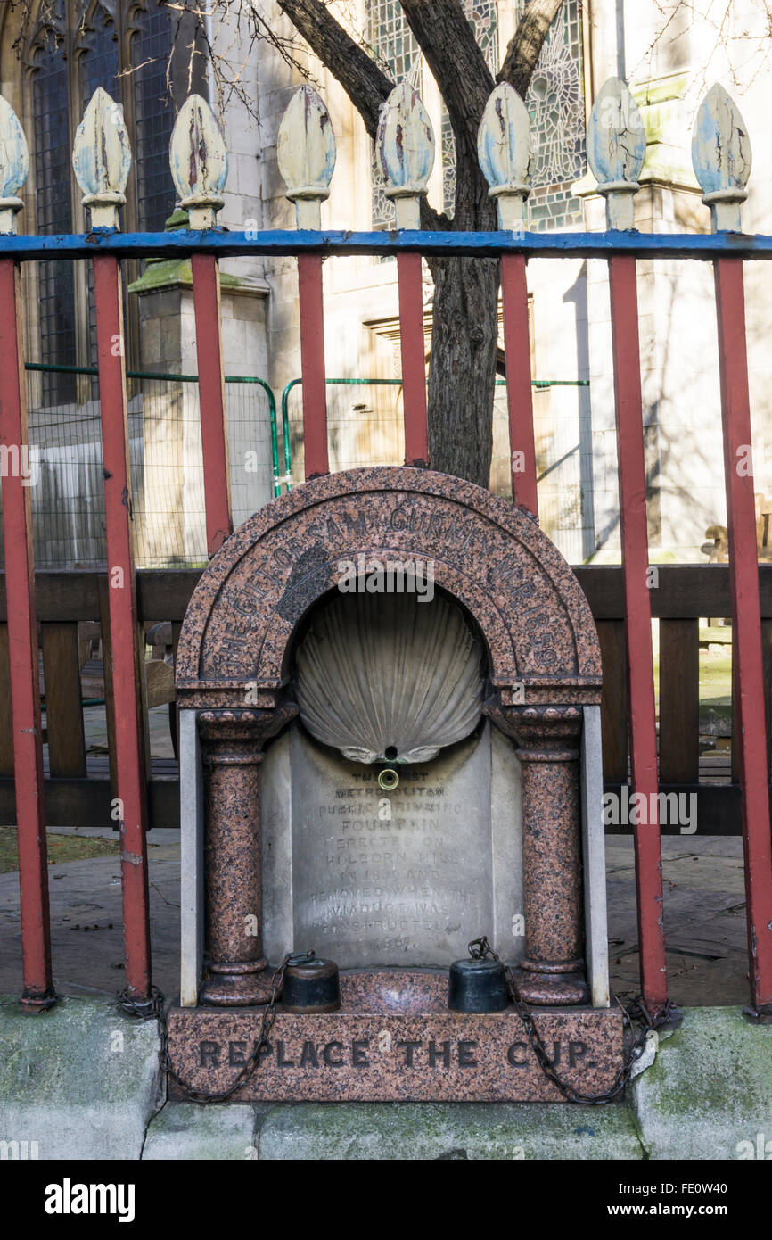 The first Metropolitan Drinking Fountain, erected in Holborn in 1859.  In wall of St Sepulchre-without-Newgate churchyard.. Stock Photo