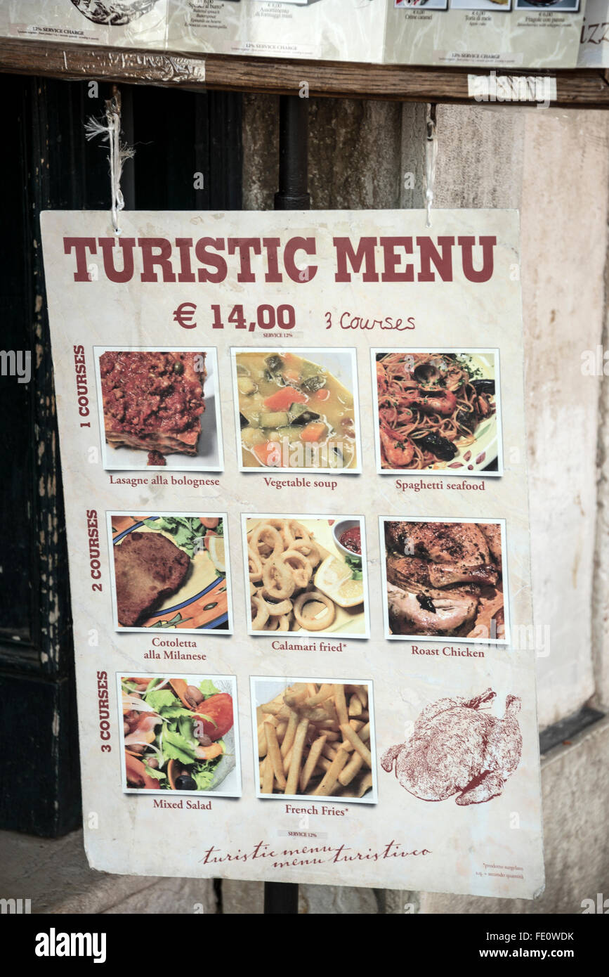 A tourist menu on display at one of the many restaurants close to the Ponte di Rialto, (Rialto Bridge) in Venice, Italy Stock Photo
