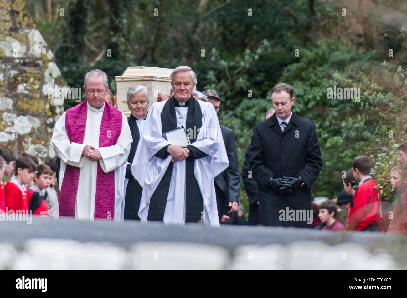 Schull, Ireland. 3rd February, 2016. Colin Vearncombe, aka 'Black' is shouldered from Holy Trinity Church, Schull. He was carried to St. Mary's Church before leaving to await cremation on 4th February, 2016. Credit: Andy Gibson/Alamy Live News. Stock Photo