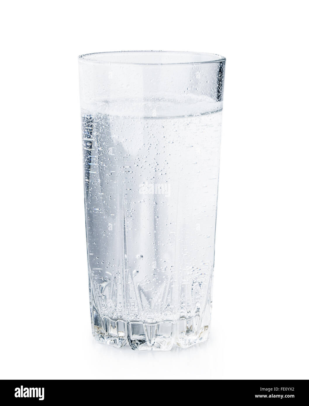 glass of mineral water bubbles Isolated on white background Stock Photo