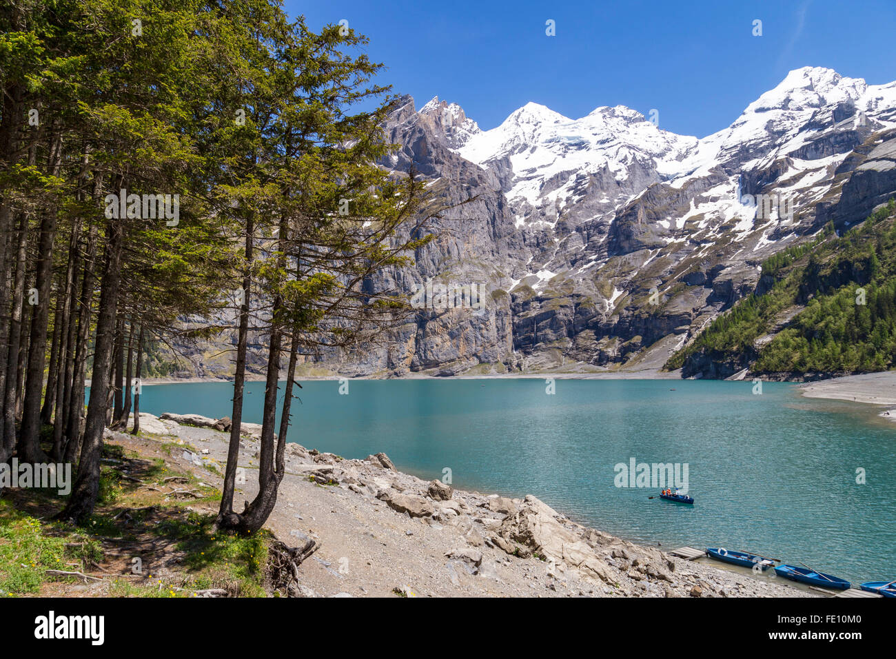 View of Oeschinensee (Oeschinen lake) with Bluemlisalp and Frundenhorn of Swiss alps on Bernese Oberland Stock Photo