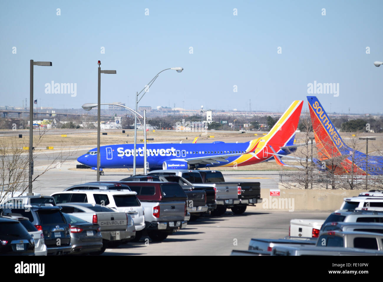 Southwest Airlines planes landing and ready for take off at  Love Field where pilots protested their lack of a contract. Credit:  Brian T. Humek/Alamy Live News Stock Photo