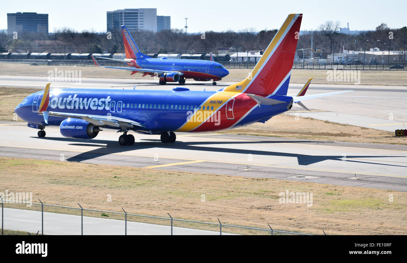 Southwest Airlines planes landing and ready for take off at Love Field where pilots protested their lack of a contract. Credit:  Brian T. Humek/Alamy Live News Stock Photo